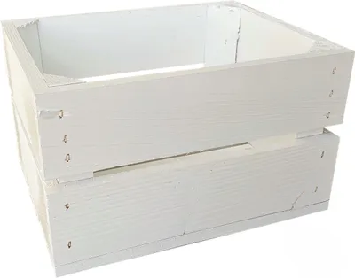 A white wooden crate is shown against a white background.