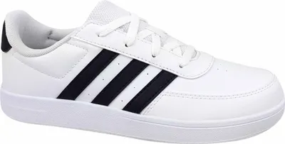A white Adidas sneaker with black stripes is shown from the side.