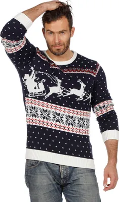 A man wearing a Christmas sweater.