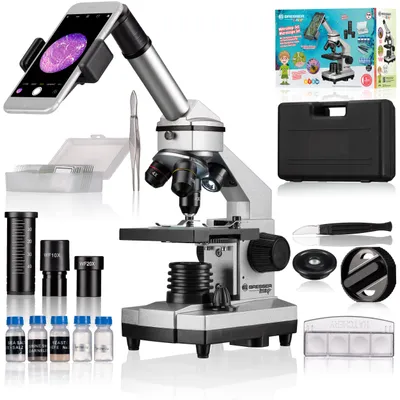A microscope set with accessories, including a smartphone holder, is displayed against a white background.