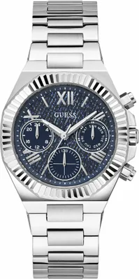 A close-up studio shot of a silver Guess watch with a blue dial.