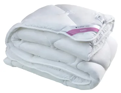 A folded white comforter is shown against a white background.