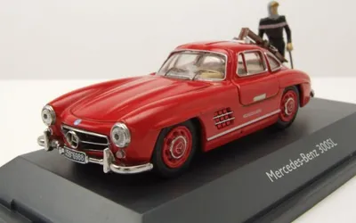 Produktbild von Schuco 1:43 MB 300 SL rot mit Ski 450376600