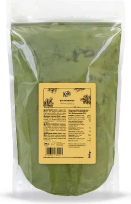 A bag of green moringa powder with a yellow label.