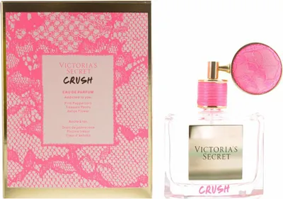 A perfume box and bottle are displayed side-by-side against a white background.