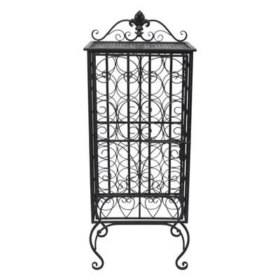 A black metal wine rack with ornate scrollwork and a fleur-de-lis accent at the top, standing on a white background.