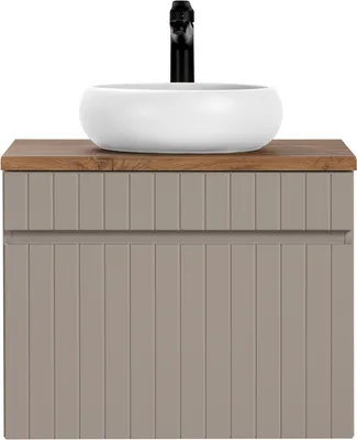 A bathroom vanity with a sink and faucet.