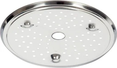 A close-up, top-down view of a round, perforated metal insert with a central hole and three raised supports.