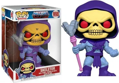 A Funko Pop! vinyl figure of Skeletor from Masters of the Universe, shown both in its packaging and outside of it.