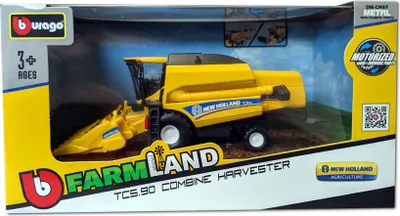A toy combine harvester in its retail packaging.