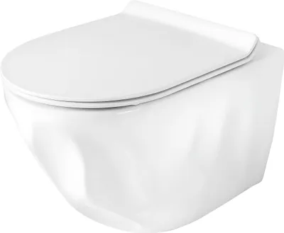 A white wall-mounted toilet with the lid down, shown from a front-side angle against a white background.