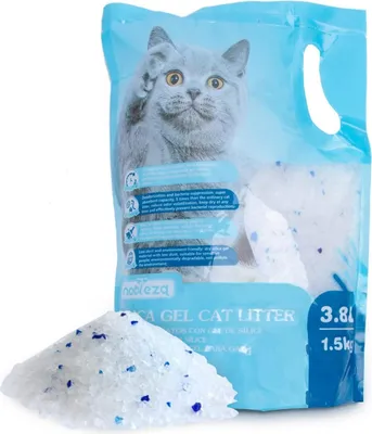 A bag of silica gel cat litter with a pile of the litter in front of it.