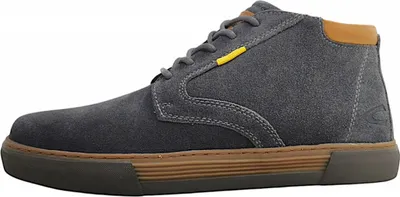 A side view of a gray suede chukka boot with brown accents and a brown sole.