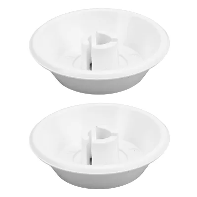 Two white spool caps are shown against a white background.