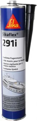 A can of Sikaflex 291i marine sealant with a nozzle attached.