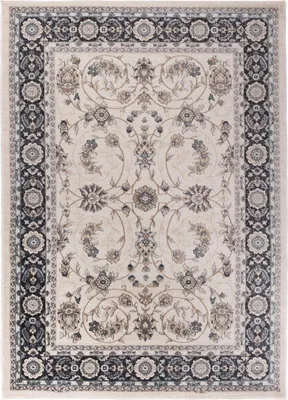 A top-down view of a rectangular rug with a cream background and a black and gray border. The rug has an intricate floral pattern in shades of gray and cream.