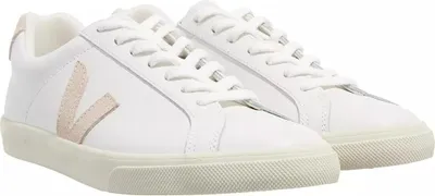 A pair of white leather Veja Esplar sneakers with beige accents.