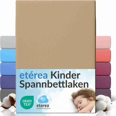 A stack of folded fitted sheets in various colors, with a close-up of a sleeping child in the foreground.