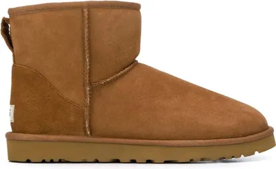A single brown Ugg boot is shown from the side against a white background.
