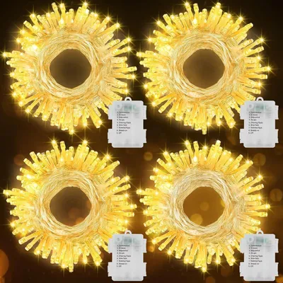 Productafbeelding van Lichtsnoer op batterijen - Set van 4 - Kerstmis - 7 m - 70 leds - Timer - 8 modi - Waterdicht - Tuin - Balkon