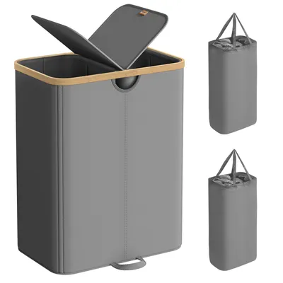 A laundry basket with two compartments and a lid, shown from the front. Two smaller, collapsed versions of the basket are shown to the right.