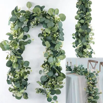 Immagine prodotto di Ghirlanda artificiale di eucalipto, 1,8 m, verde con fiori bianchi