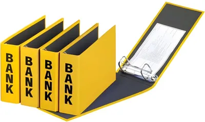 Four yellow binders labeled 'BANK' are lined up, with one binder open to show its contents and metal rings.