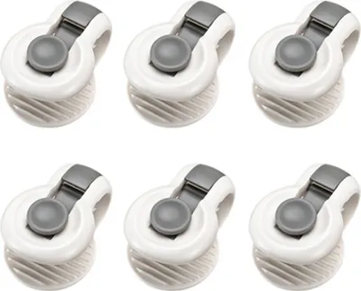 Six white and gray bed sheet clips arranged in two rows of three.