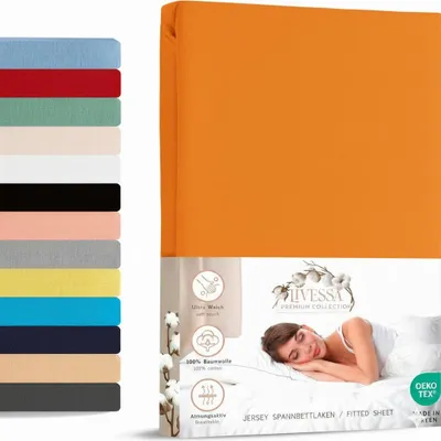 A product image showing a folded orange fitted sheet on the right and a stack of fitted sheets in various colors on the left, with packaging details at the bottom.