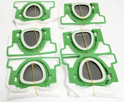 A top-down view of a set of vacuum cleaner bags, arranged in a grid.