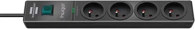 A close-up, straight-on view of a black power strip with four outlets and a green power switch.