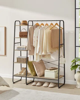 A clothing rack with various garments, accessories, and decorative items displayed on shelves.
