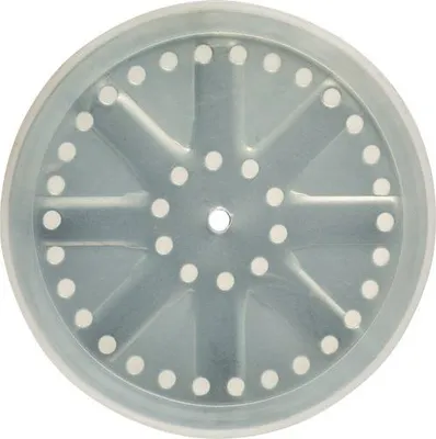A top-down view of a round, perforated filter disc with a transparent outer rim.