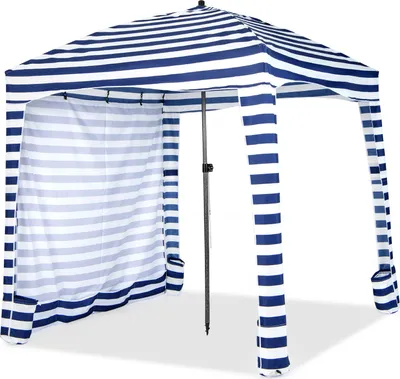A striped beach tent with a removable side wall.