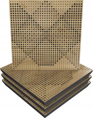 A stack of acoustic wall panels with a perforated pattern.