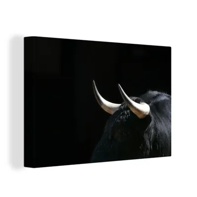 Produktbild von OneMillionCanvasses® - Leinwandbilder - 150x100 cm, Ein Foto von einem schwarzen Stier vor einem schwarzen Hintergrund, Wandbilder Kunstdruck Wanddekoration