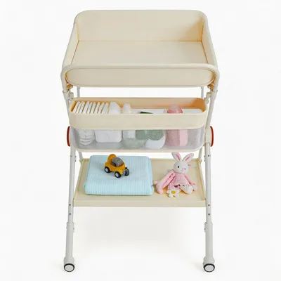 Produktbild von Baby Wickeltisch - Klappbarer Wickeltisch - Höhenverstellbar, große Ablage, Sicherheitsgurt, Rollen, beige