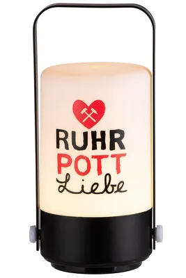 A decorative LED lantern with text and graphics.