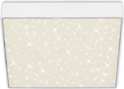 A white ceiling light with a star pattern on the diffuser.