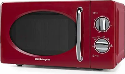 A red Orbegozo microwave oven is shown against a white background.