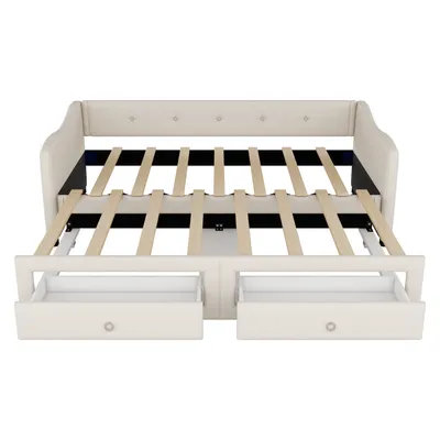 A beige daybed with two drawers pulled out, showing the wooden slats of the mattress support.