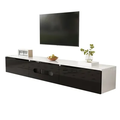 A modern, wall-mounted TV cabinet with a high-gloss black front and a white top, shown against a white background.