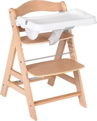 A wooden high chair with a white tray.