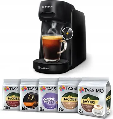 A Bosch Tassimo coffee machine with a cup of coffee and several packs of coffee capsules.