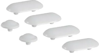 A collection of white toilet seat buffers arranged on a white background.