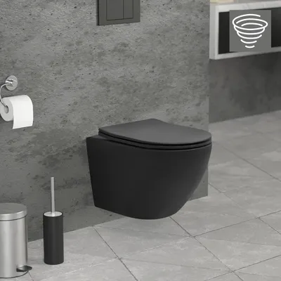 A modern black wall-hung toilet in a bathroom setting with concrete walls and tiled floor.