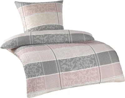 A bedding set, including a duvet cover and a pillowcase, displayed on a white background.