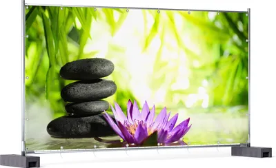 Produktbild von Wallario XXL Outdoor-Poster für Garten oder Balkon, Motiv Steinstapel in schwarz mit Blumenblüte in lila, in ca. 340 x 173 cm