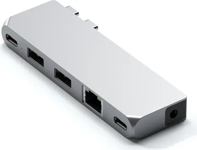 A silver USB hub with multiple ports is shown on a white background.