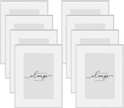 A collection of empty picture frames arranged in a grid.